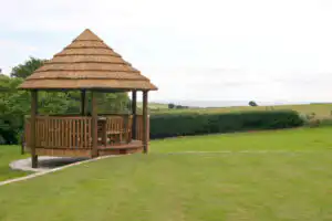 Breeze House Amanzi in garden surrounded by grass