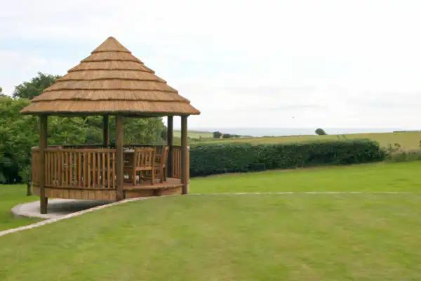 Breeze House Amanzi in garden surrounded by grass
