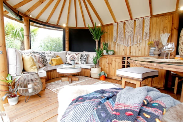 Interior of a Breeze House Oval Safari styled with a boho theme