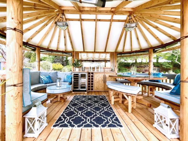 Interior of a Breeze House Oval Safari styled with blue accessories