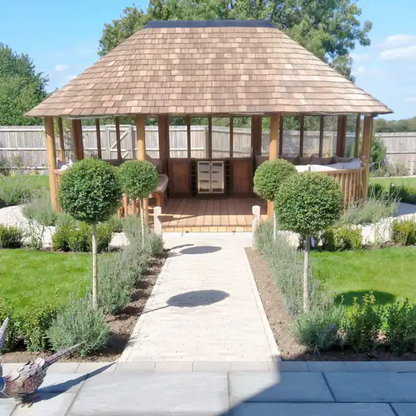 Breeze House Oval Safari with lollipop trees leading to entrance