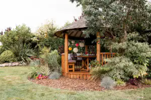 breeze house grill styled for party with balloons