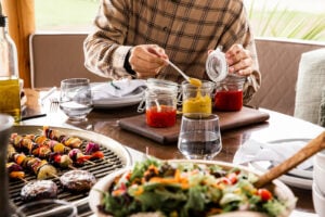 people eating food inside breeze house grill