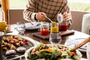 people eating food inside breeze house grill