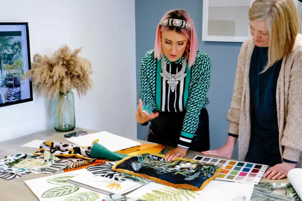 Avalana discussing designs inside a Breeze House