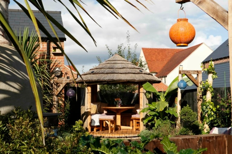 Adam Robinson's garden featuring a Breeze House, transformed by ITV’s “Love Your Garden"