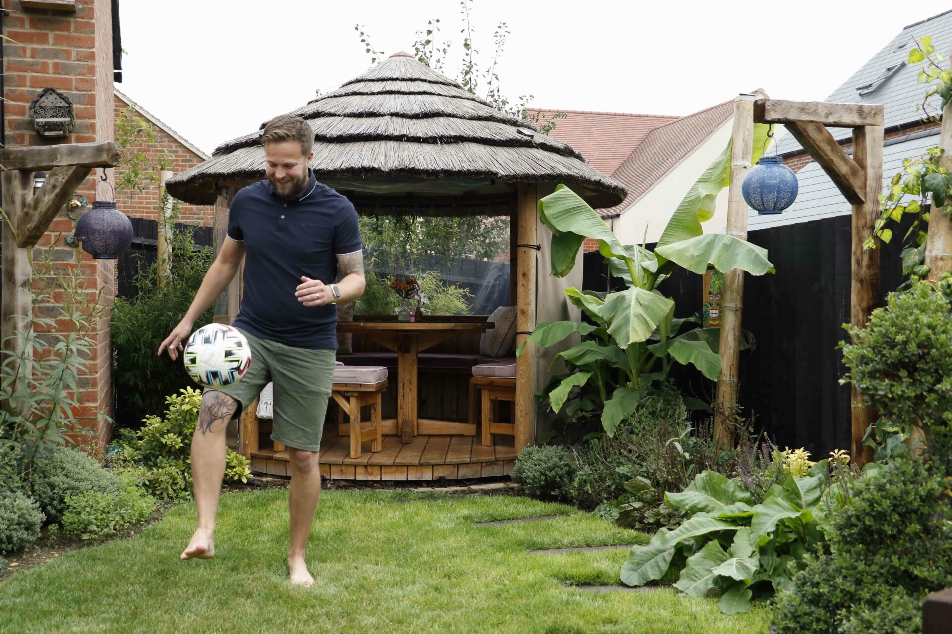 Adam practising his football skills in front of the newly installed Breeze House after ITV's Love Your Garden transformation.