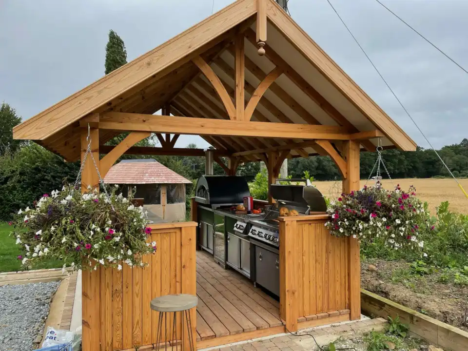 breeze house bespoke garden building covering outdoor kitchen