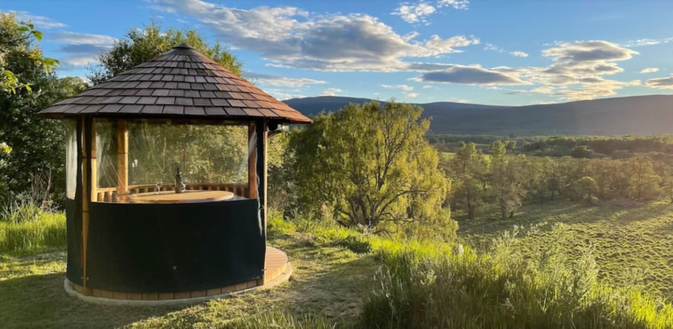 Breeze House overlooking vast open space and cloudy sky
