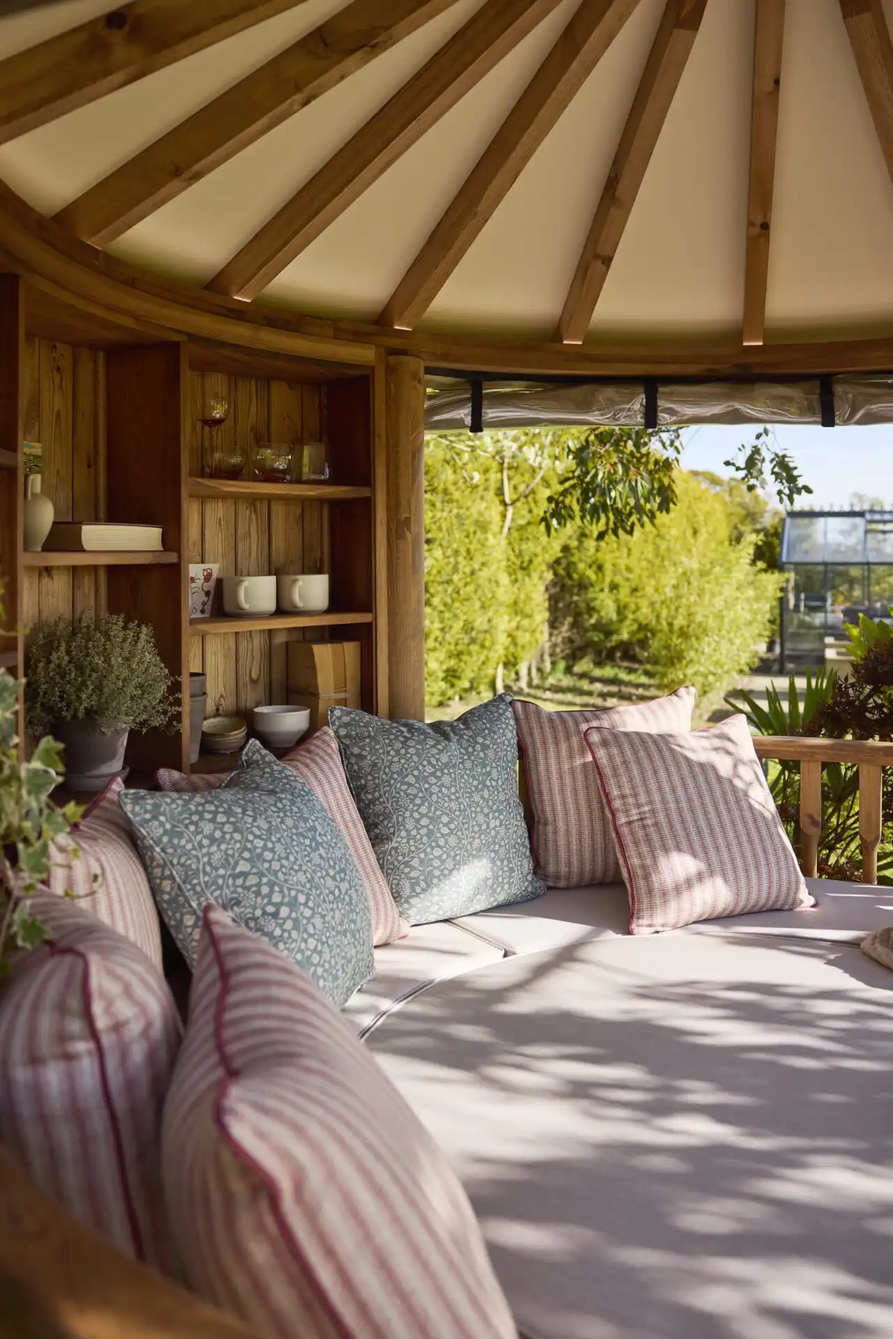 breeze house day bed patterned coloured cushions inside RHS breeze house