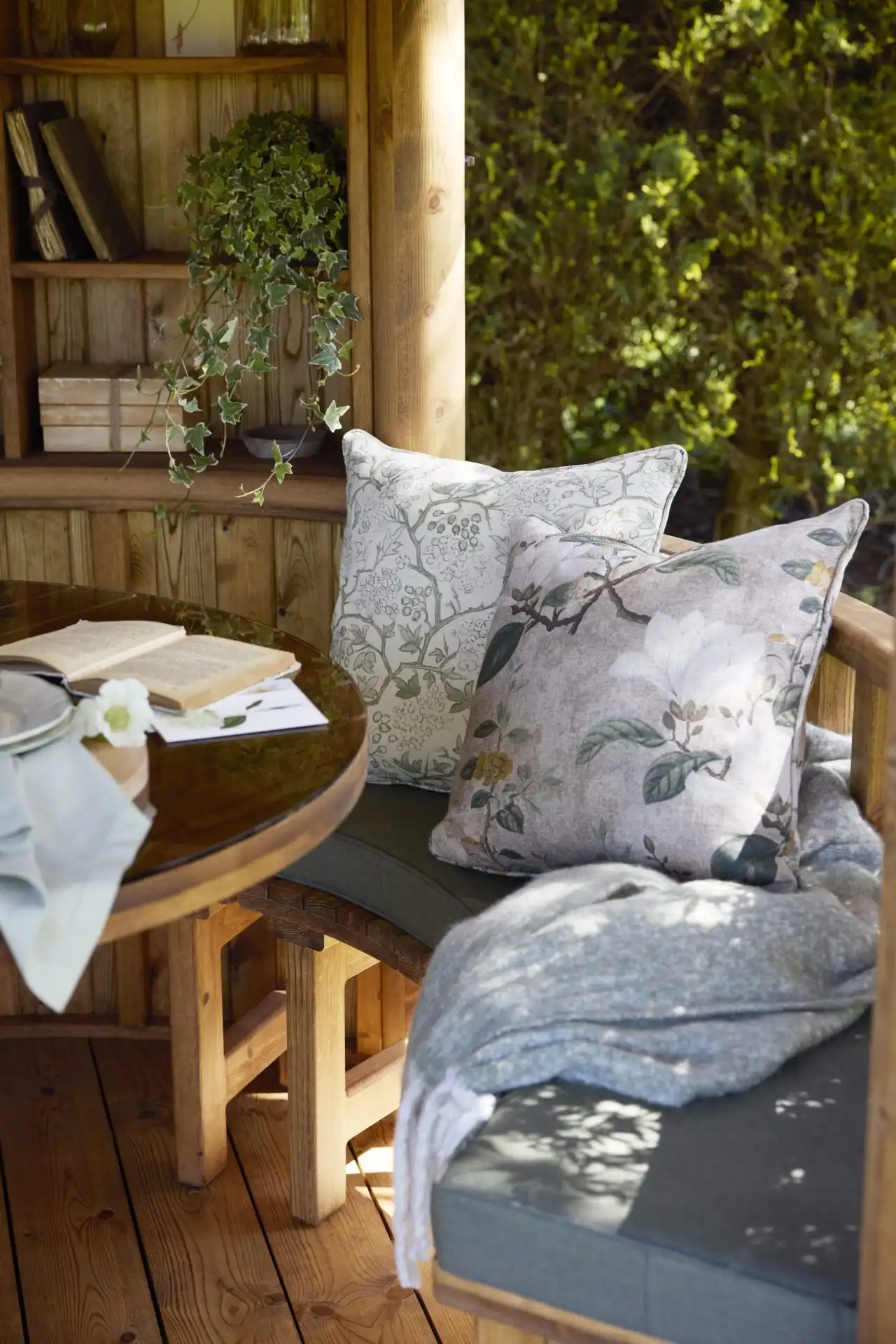 decorative bench cushions on benches inside RHS breeze house